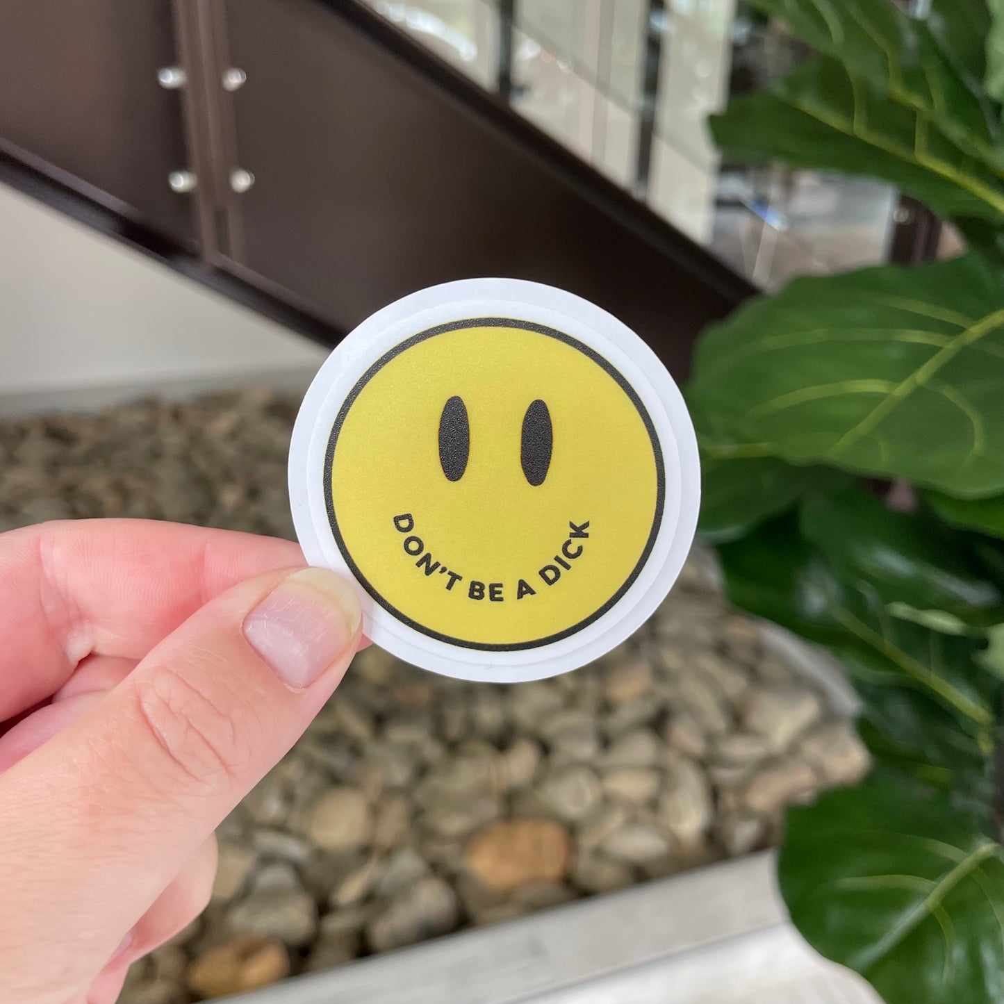 yellow smiley face and the smile says don't be a dick