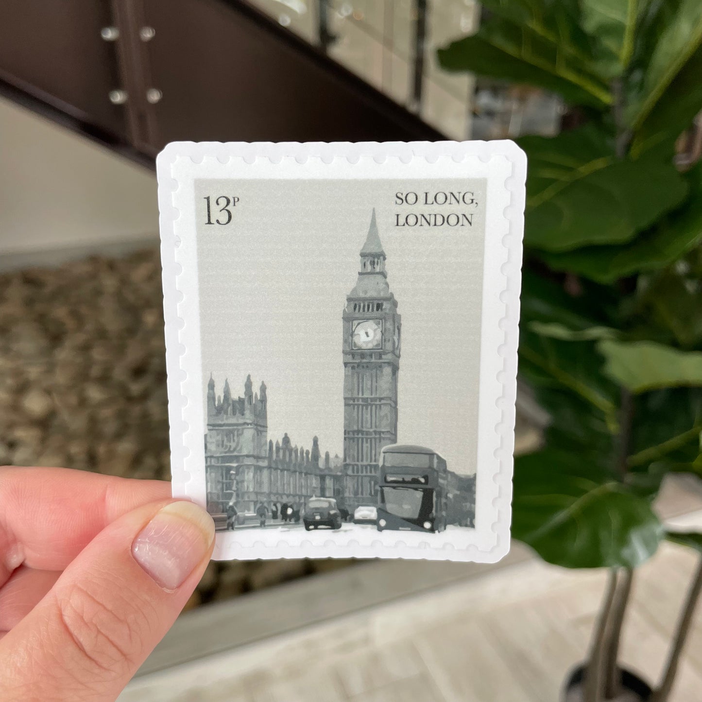 postage stamp shaped sticker of big ben that says so long, london