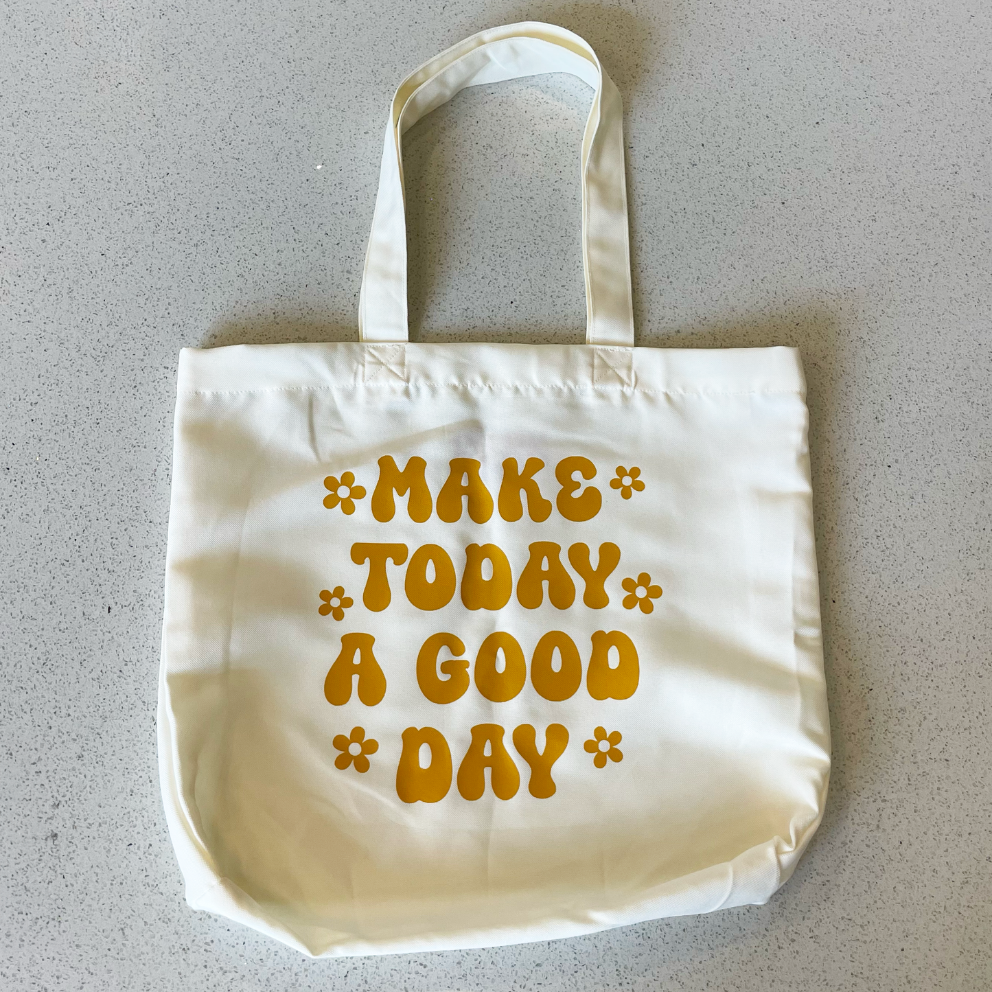 tote bag that says make today a good day in orange