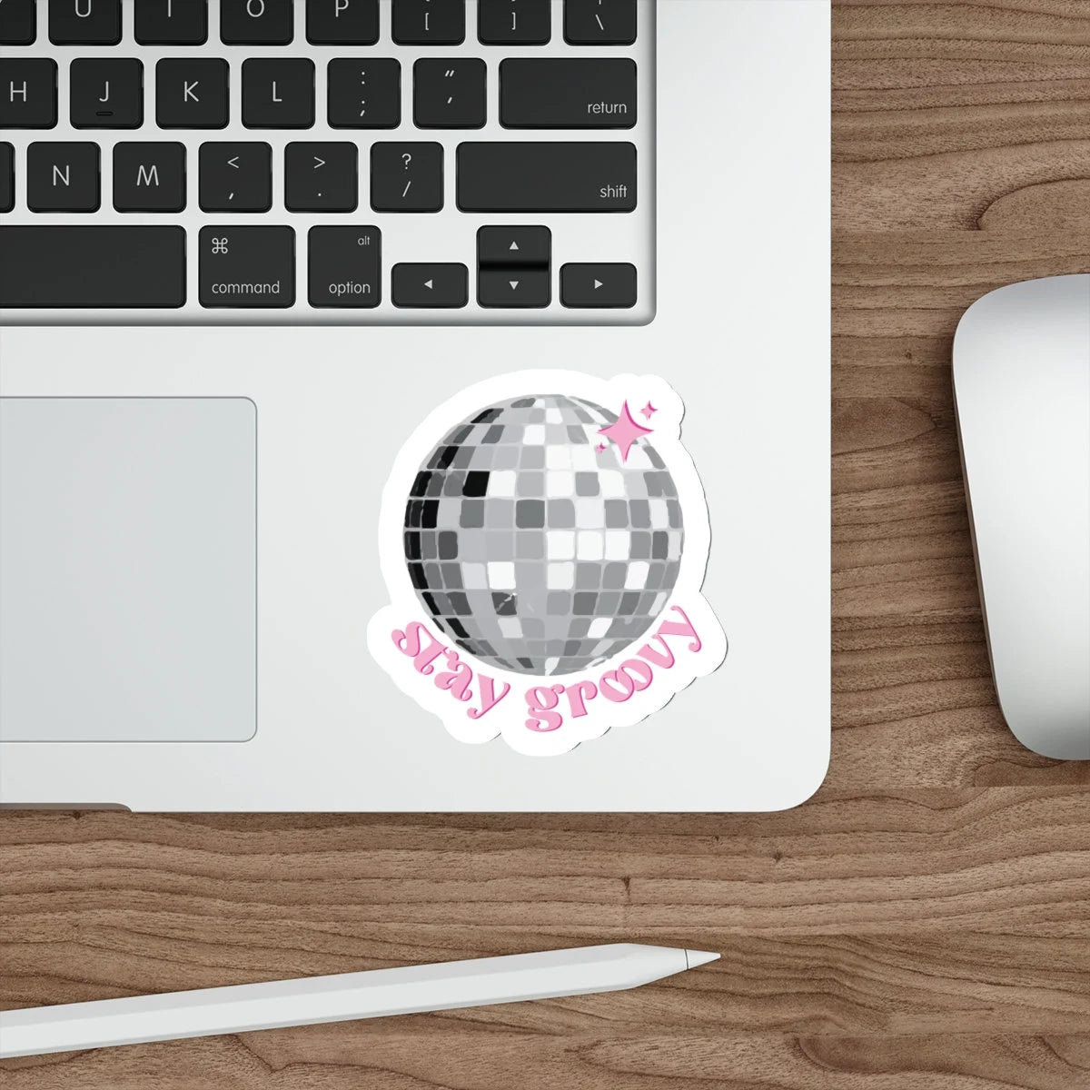 stay groovy disco ball sticker with pink writing on a laptop