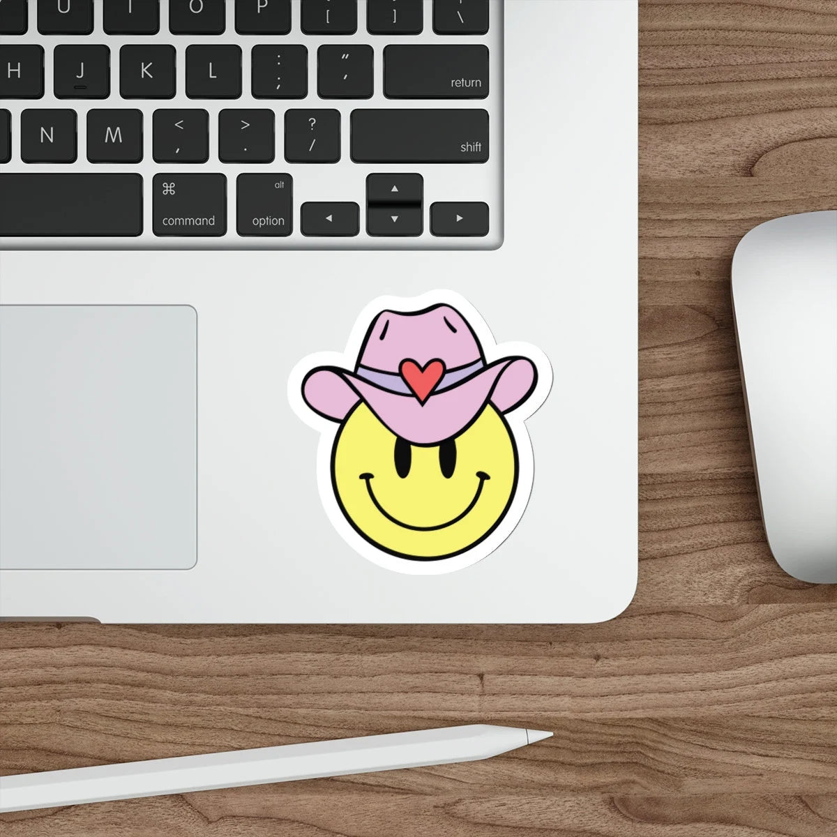 smiley-face-with-cowboy-hat-sticker-on-laptop